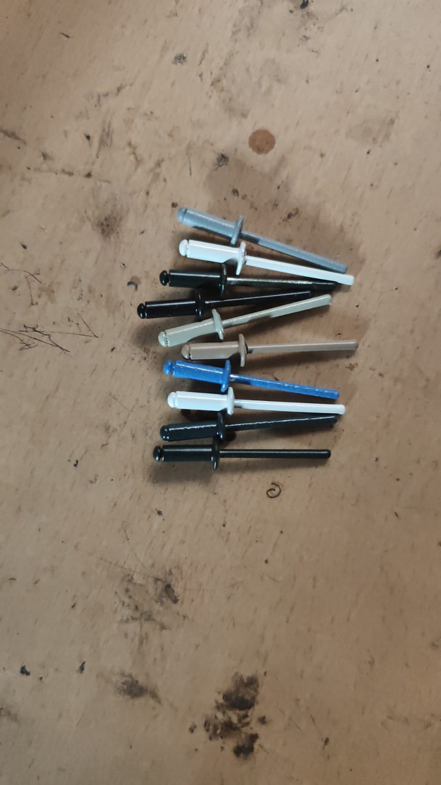 Colour pop rivets for roofing and cladding applications